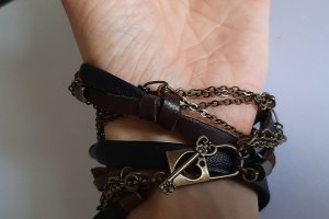 Браслет из натуральной черной и коричневой кожи - Описание