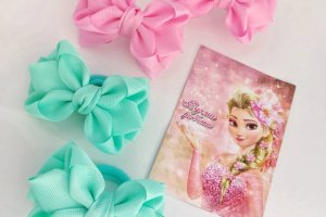 Ніжні бантики з репсової стрічки  - Опис