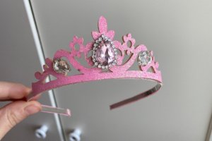 Корона рожева менша 1 - Опис