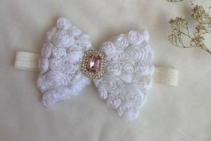 Повязка большой белый бант - Описание