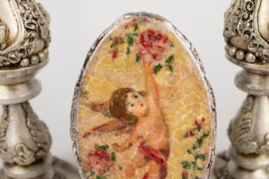 Декоративный набор из интерьерной украшения и подсвечников - Описание