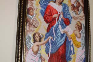 Образ Богородица, решает узлы - Описание