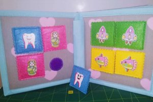 Розвиваюча книжечка із фетру та тканини - Опис