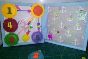 Розвиваюча книжечка із фетру та тканини - Опис