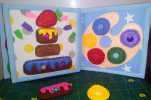 Розвиваюча книжечка із фетру та тканини - Опис