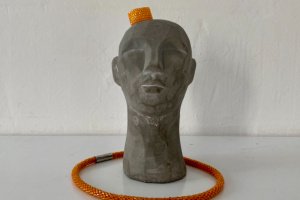 Оранжевый жгут на шею из бисера - Описание