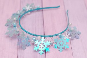 Обруч обідок сніжинки блакитний - Опис