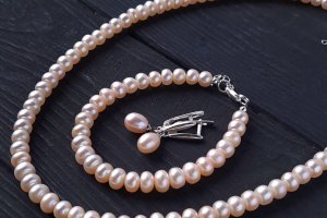 Серебряные серьги с жемчугом и фианитами. - Описание