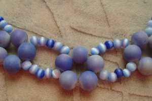 Кольє з намистинами котячого ока - Опис