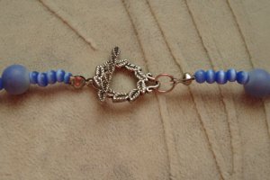 Кольє з намистинами котячого ока - Опис