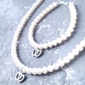 Работа Комплект из натурального жемчуга в серебре 2 сердца