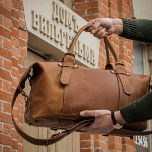 Робота Шкіряна спортивна сумка. дорожчаючи сумка