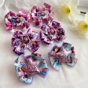 Работа Бантики- резинки маленькие волшебницы и Дора