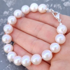 Робота Браслет з великих натуральних перлів у сріблі