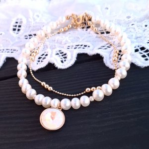 Работа Браслет из натурального жемчуга и Swarovski в позолоте