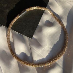 Работа Золотой жгут на шею из бисера.