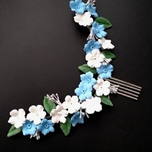 Робота Гребінець з блакитними квітами