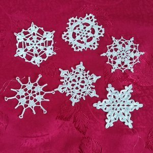 Робота Комплект в'язаних сніжинок