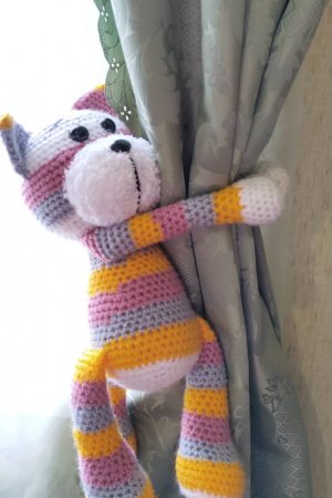 Робота Кот-підхоплення для штор.