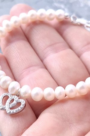 Работа Браслет из натурального жемчуга в серебре с кристаллами 2 сердца