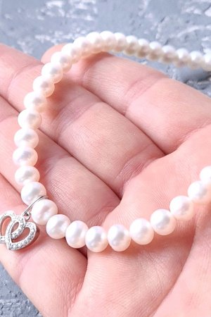 Работа Колье из натурального жемчуга в серебре с кристаллами 2 сердца