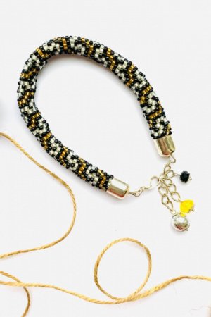 Работа Браслет жгут из бисера античное плетение