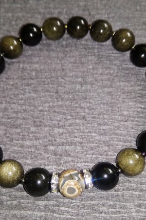 Робота Браслет з золотистого обсидіану з бусиной Дзи