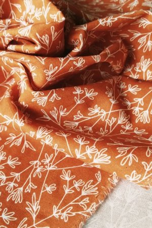 Робота Тканина бавовна для рукоділля гілочки на теракотовому тлі