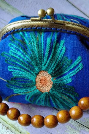 Робота Текстильна сумочка- косметичка з вишивкою і фермуаром