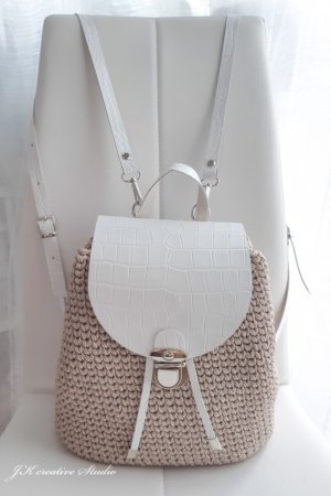 Робота Рюкзак з тисненням на шкірі