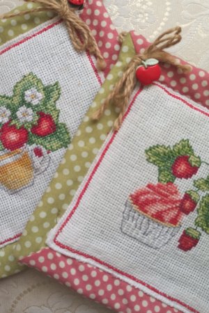 Робота Прихвачує для гарячого полуничка Пироженко