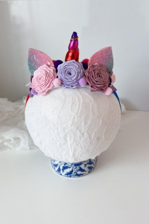 Робота Повязка єдиноріг рожево-фіолетова.