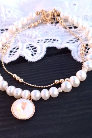 Работа Браслет из натурального жемчуга и Swarovski в позолоте