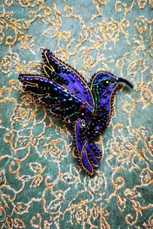 Робота Брошка калибри