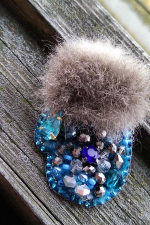 Робота Брошка в рукавичках