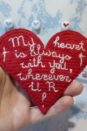 Робота В'язана підставка під посуд гаряче. Серце з вишивкою 2