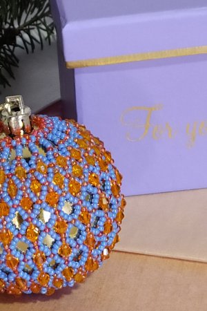 Робота Новорічна іграшка блакитно-золота куля